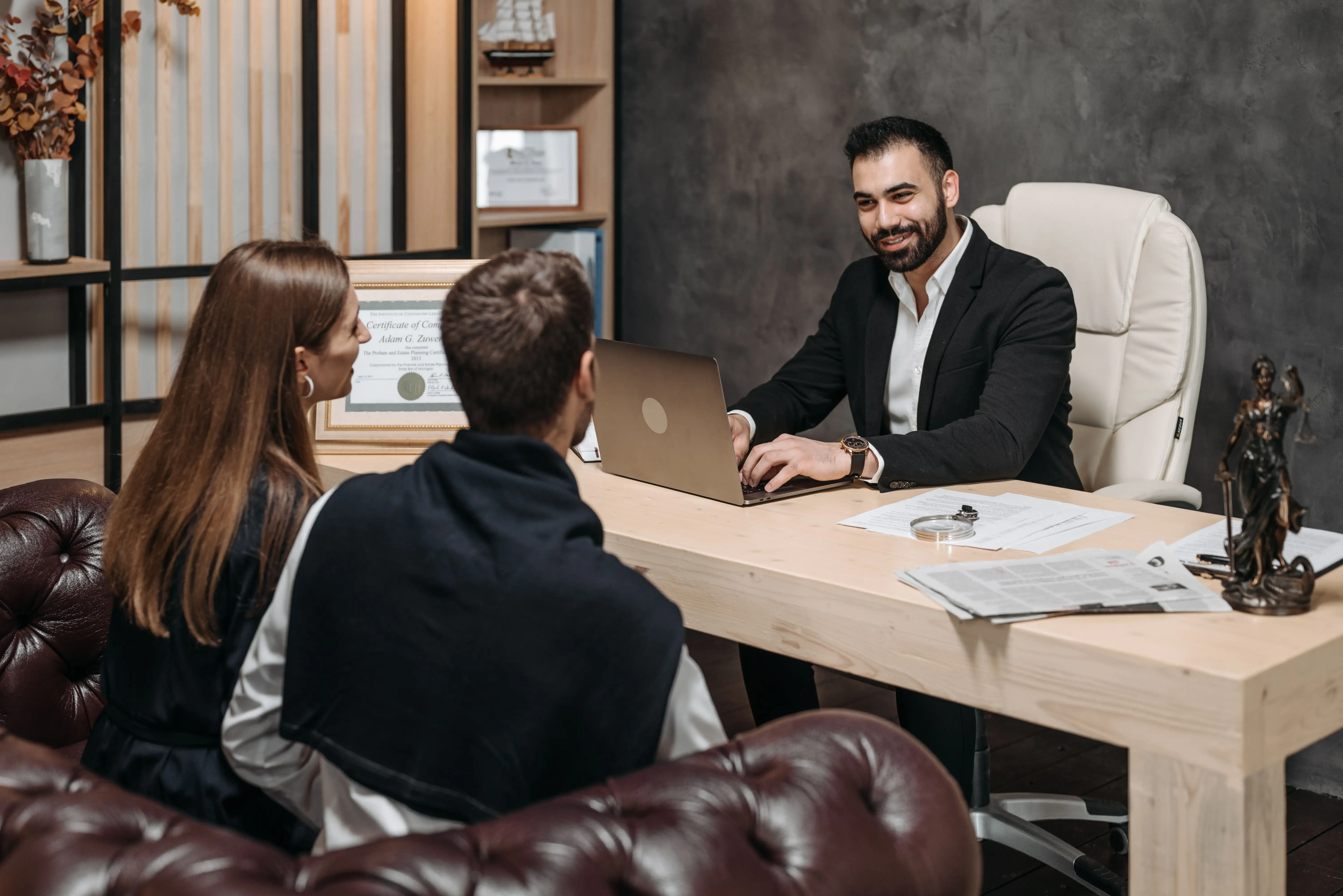 Wealth advisor discussing investment options with clients